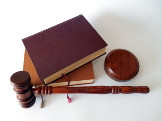 Law books and a gavel